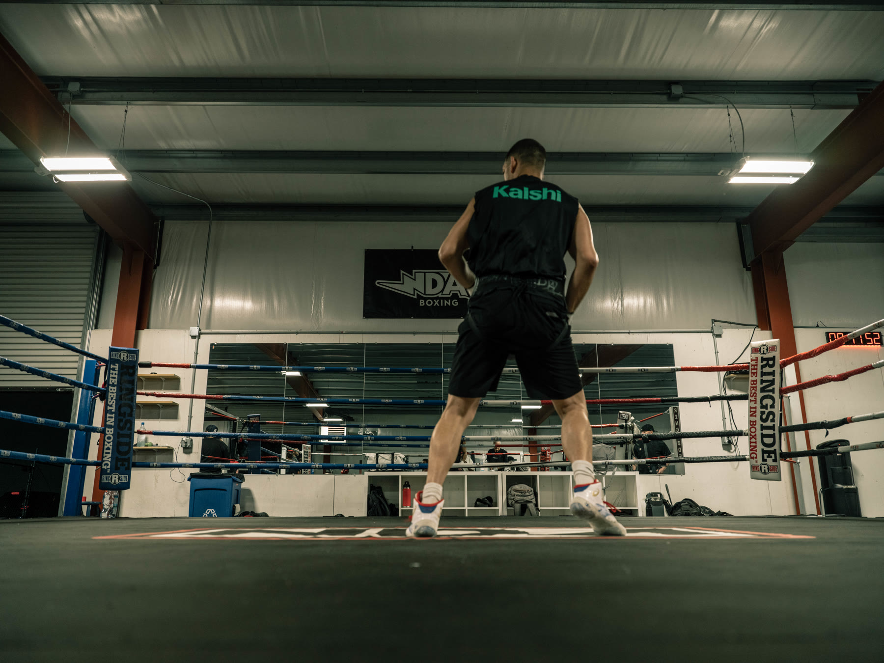Nate Diaz from behind, facing the empty ring